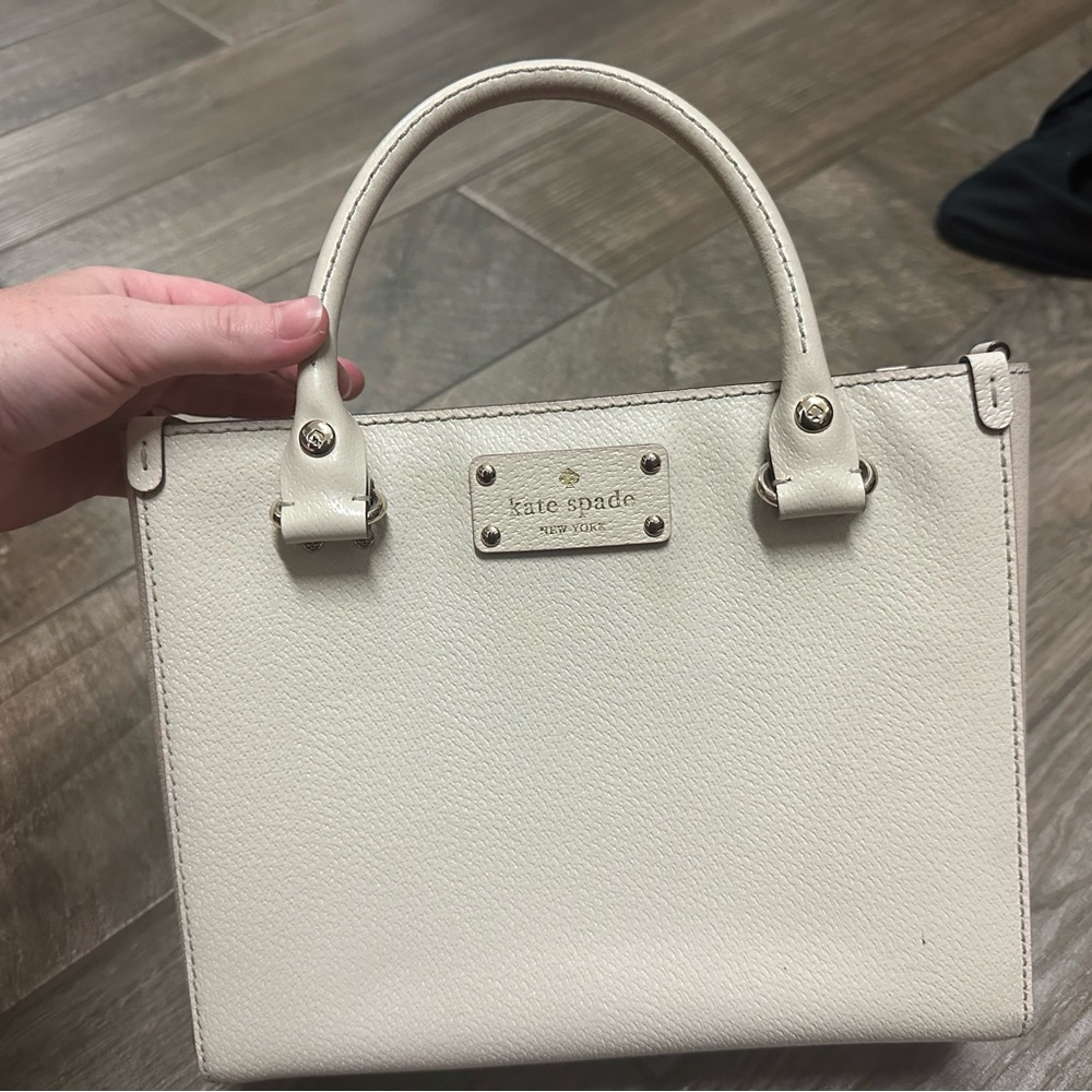Kate spade tan bag minor stain in picture but otherwise great condition